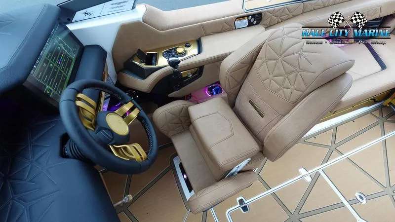 Slide: The Image of Luxurious interior of 2025 Nautique Super Air Nautique G23 Paragon boat with plush seating. - 43