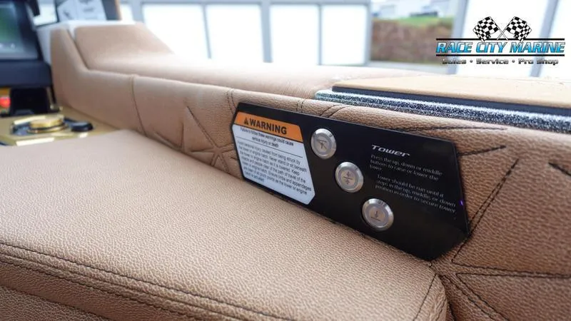 Slide: The Image of Interior detail of 2025 Nautique Super Air Nautique G23 Paragon boat with warning label. - 44