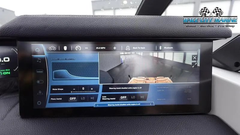 Slide: The Image of 2025 Nautique Super Air Nautique G23 Paragon dashboard display with advanced controls and navigation. - 47