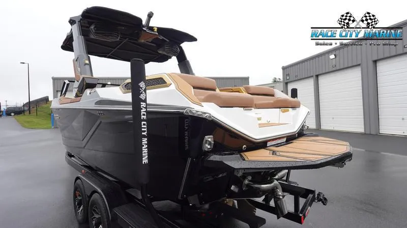 Slide: The Image of 2025 Nautique Super Air Nautique G23 Paragon boat at Race City Marine dealership. - 7