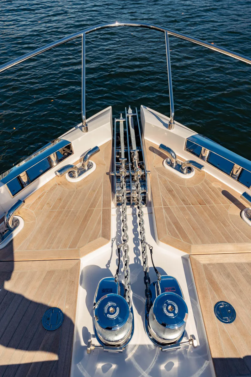 Slide: The Image of Bow view of 2023 Ferretti Yachts 860, showcasing anchor chains and teak deck. - 10