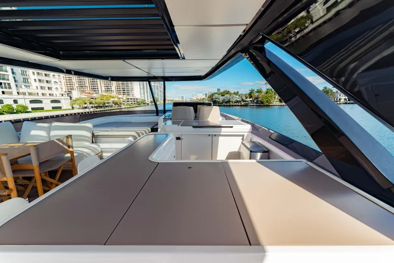 Slide: The Image of Luxurious 2023 Ferretti Yachts 860 with spacious deck and waterfront view. - 30