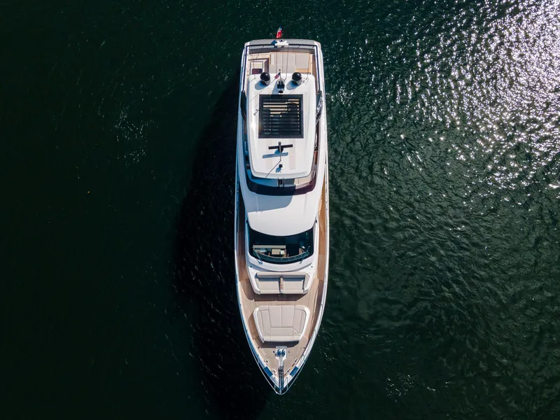 Slide: The Image of Aerial view of 2023 Ferretti Yachts 860 on shimmering water. - 4