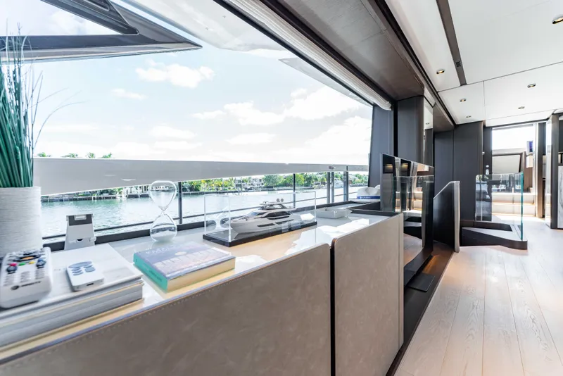 Slide: The Image of Luxurious interior of 2023 Ferretti Yachts 860 with modern design and scenic water views. - 41