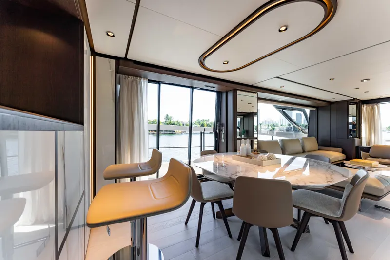 Slide: The Image of Luxurious interior of 2023 Ferretti Yachts 860 with elegant dining area and modern design. - 43
