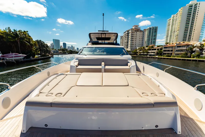 Slide: The Image of 2023 Ferretti Yachts 860 on a sunny waterfront, showcasing luxury and modern design. - 7