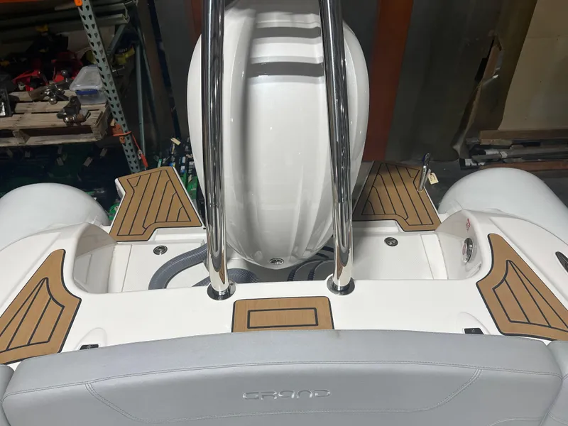 Slide: The Image of 2024 Grand Goldenline 850 boat interior with sleek design and wooden accents. - 12