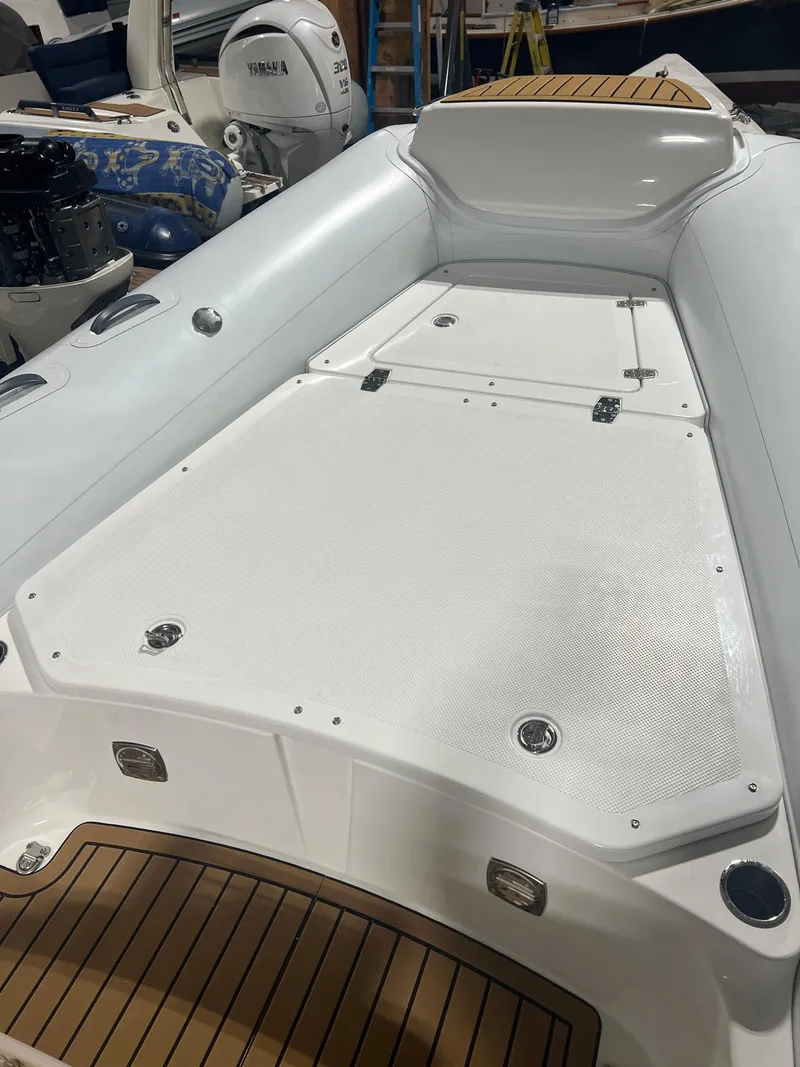 Slide: The Image of 2024 Grand Goldenline 850 boat deck with sleek design and modern features. - 9