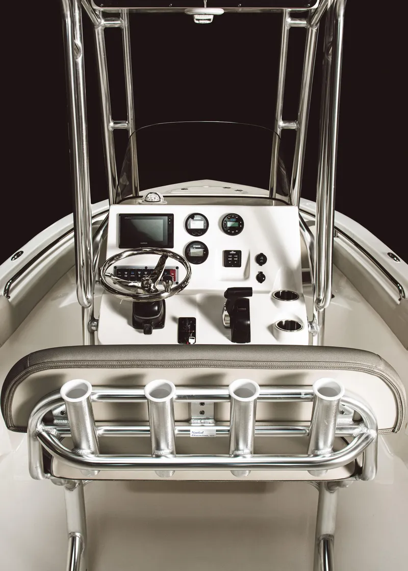 Slide: The Image of 2025 Key West 203 FS boat console with steering wheel and gauges. - 3