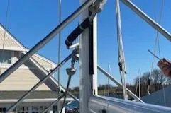 Slide: The Image of Mast rigging on a 1989 Catalina 30 sailboat against a clear blue sky. - 21