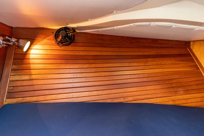 Slide: The Image of Interior of 2003 Hinckley Talaria 29 Runabout with wooden paneling and spotlight. - 40