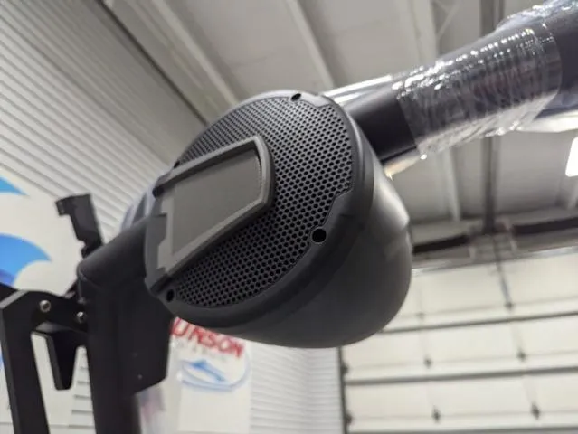 Slide: The Image of Close-up of Axis A225 speaker system, 2025 model, in a garage setting. - 12