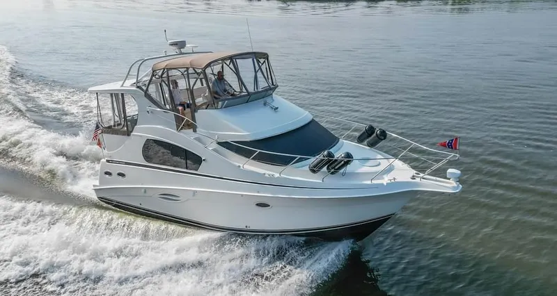 The Image of 2007 Silverton 35 Motor Yacht cruising on calm waters. - 0