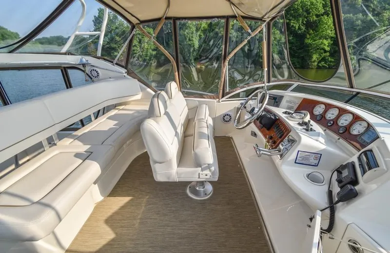 Slide: The Image of Luxurious 2007 Silverton 35 Motor Yacht interior with plush seating and modern controls. - 20