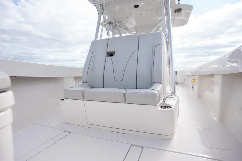 Slide: The Image of 2022 SeaVee 370z boat with sleek seating and modern design. - 15