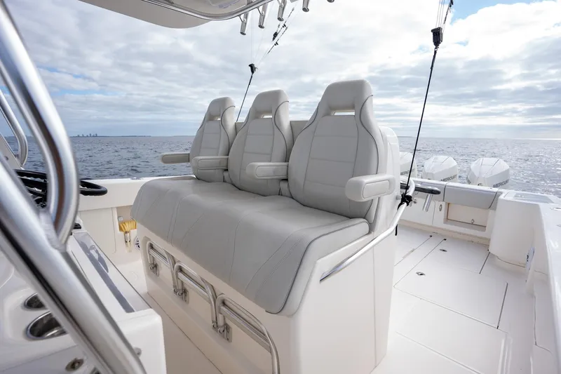 Slide: The Image of 2022 SeaVee 370z boat with sleek seating, ocean view, and modern design. - 23