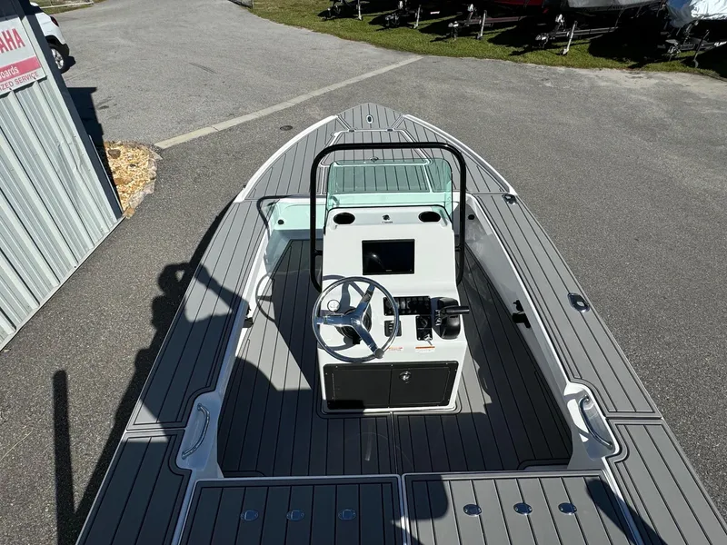 Slide: The Image of 2025 Action Craft 17 Flyfisher boat with sleek design and modern console. - 7