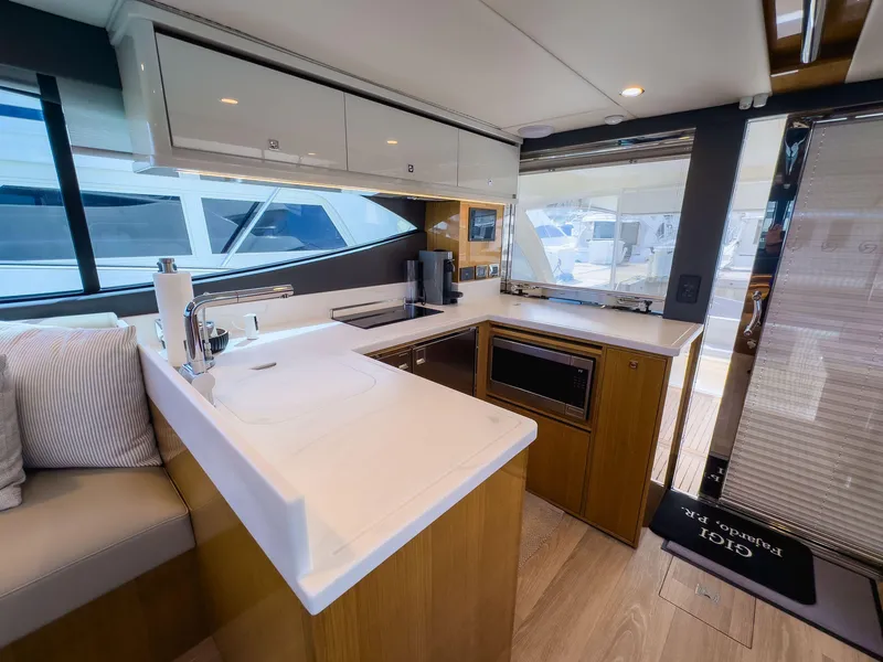 Slide: The Image of Modern kitchen interior of 2024 Riviera SMY 46 yacht with sleek countertops and appliances. - 15