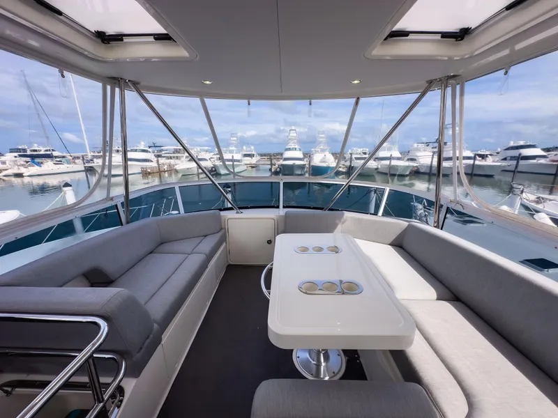 Slide: The Image of Luxurious interior of 2024 Riviera SMY 46 yacht with marina view. - 18