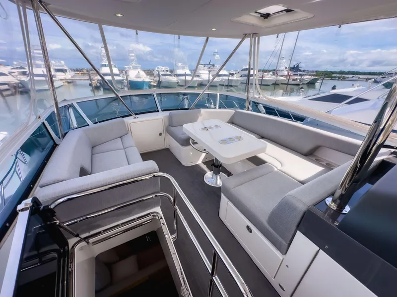 Slide: The Image of Luxurious 2024 Riviera SMY 46 yacht interior with spacious seating and elegant design. - 4