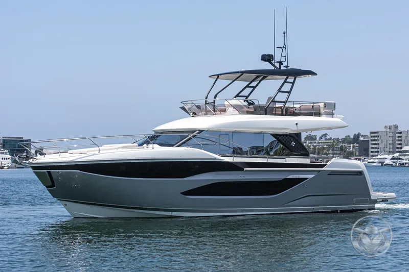 The Image of 2025 Prestige F4.9 yacht cruising on calm waters, showcasing sleek design and modern features. - 0