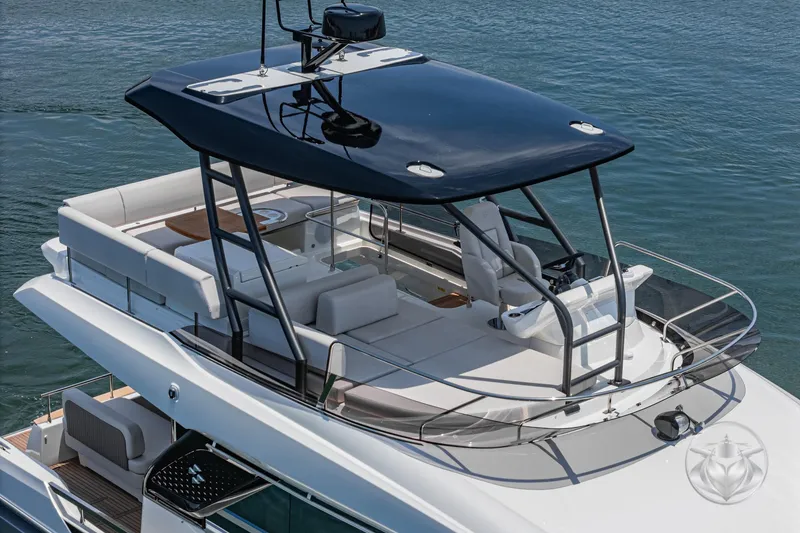Slide: The Image of Luxury Prestige F4.9 yacht, 2025 model, featuring sleek design and spacious upper deck. - 11