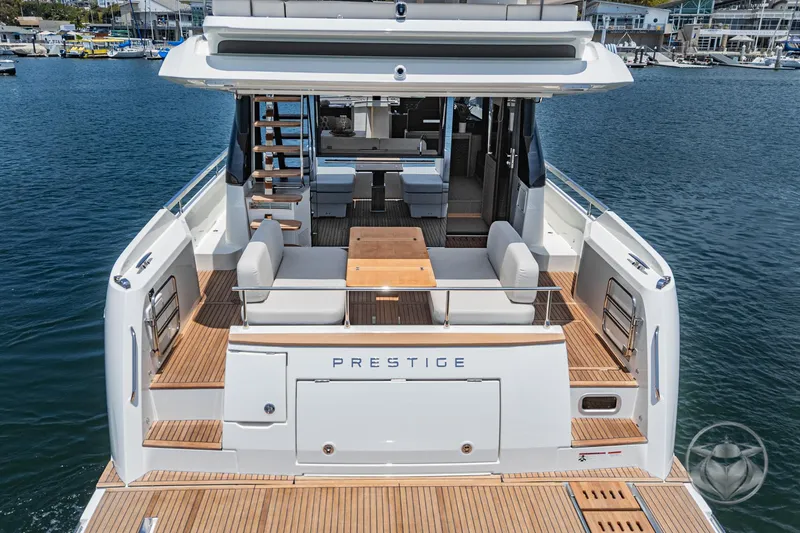 Slide: The Image of Luxury Prestige F4.9 yacht, 2025 model, featuring elegant deck and seating area. - 21