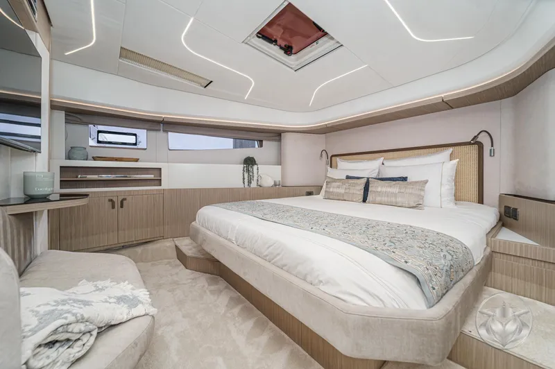 Slide: The Image of Luxurious 2025 Prestige F4.9 yacht bedroom with modern design and elegant decor. - 34