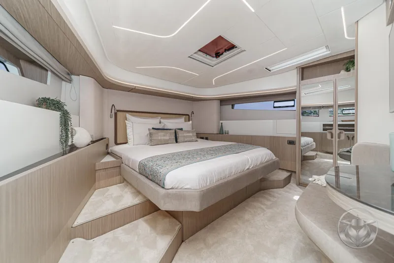 Slide: The Image of Luxurious 2025 Prestige F4.9 yacht bedroom with modern design and elegant decor. - 35