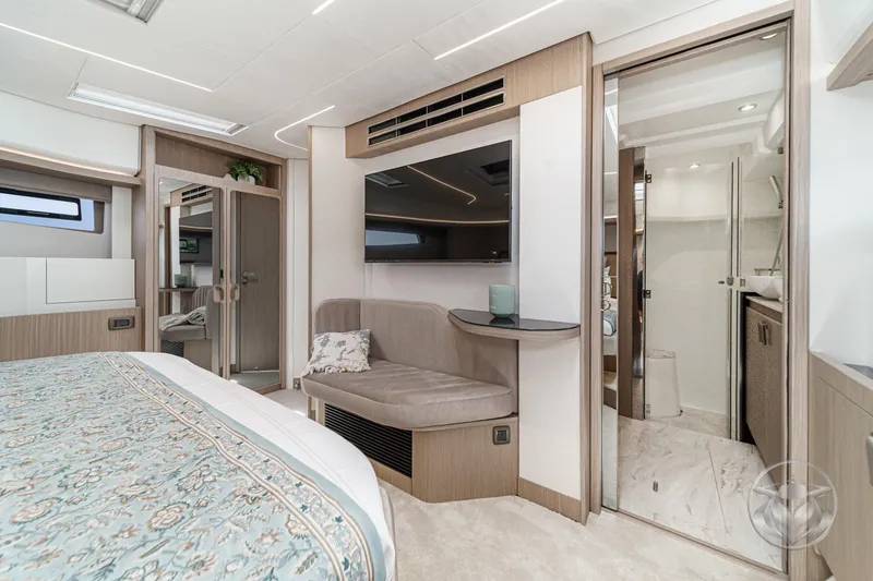 Slide: The Image of Luxurious Prestige F4.9 2025 yacht interior with elegant bedroom and modern bathroom. - 36
