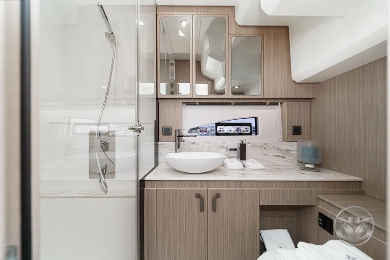 Slide: The Image of Luxurious bathroom in 2025 Prestige F4.9 yacht with modern fixtures and elegant design. - 41