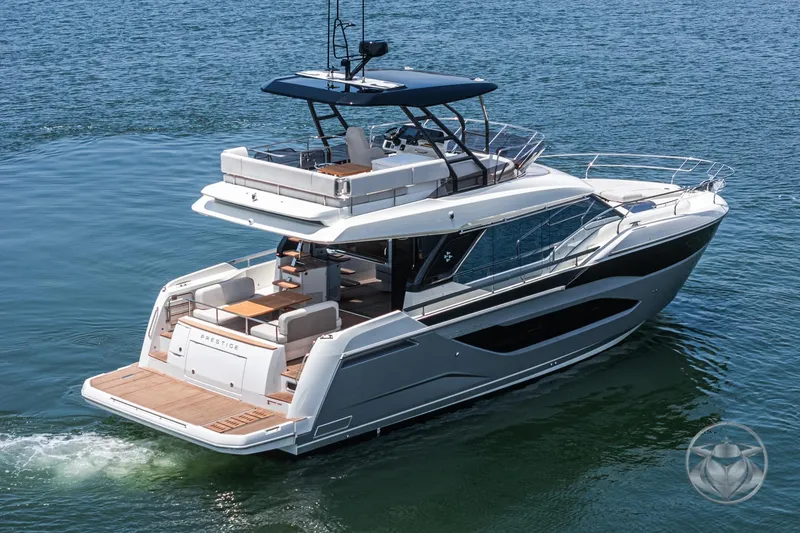 Slide: The Image of Luxury Prestige F4.9 yacht cruising on open water, 2025 model. - 5