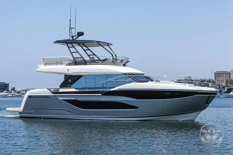 Slide: The Image of Luxurious 2025 Prestige F4.9 yacht cruising on calm waters, showcasing sleek design and modern features. - 7