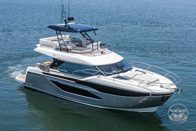 Slide: The Image of Luxury 2025 Prestige F4.9 yacht cruising on open water. - 8