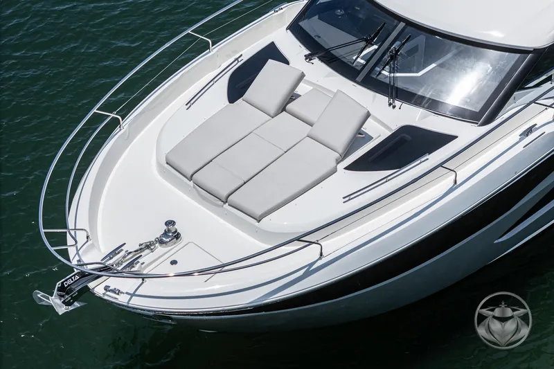 Slide: The Image of 2025 Prestige F4.9 yacht with sunbathing deck, sleek design, and modern features. - 9