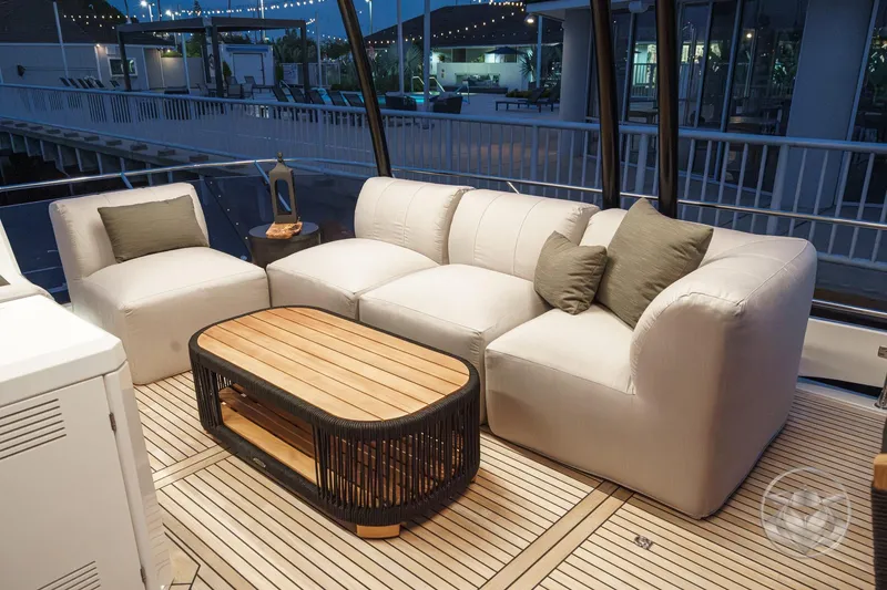 Slide: The Image of Luxurious seating area on 2026 Prestige M48 yacht with elegant decor. - 25