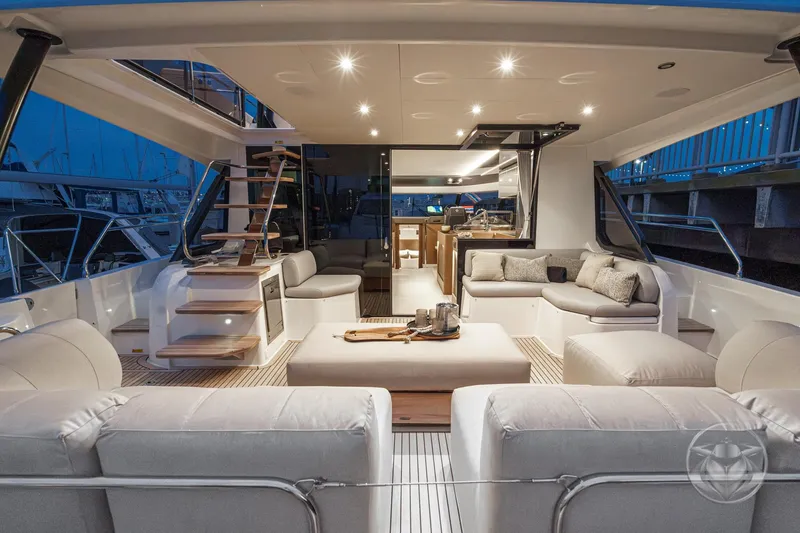 Slide: The Image of Luxurious 2026 Prestige M48 yacht interior with elegant seating and ambient lighting. - 29