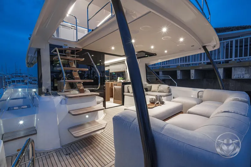 Slide: The Image of Luxurious Prestige M48 yacht interior, 2026 model, featuring elegant seating and ambient lighting. - 30