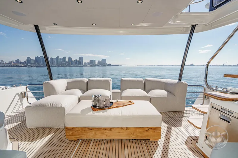 Slide: The Image of Luxurious 2026 Prestige M48 yacht interior with city skyline view. - 32
