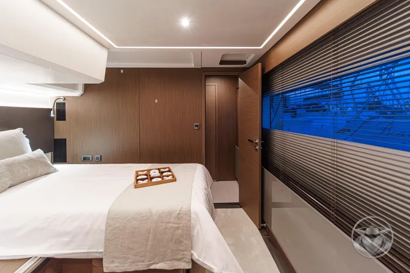 Slide: The Image of Luxurious interior of 2026 Prestige M48 yacht with elegant wood paneling and modern lighting. - 43