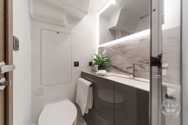 Slide: The Image of Modern bathroom in 2026 Prestige M48 yacht with sleek design and elegant fixtures. - 49