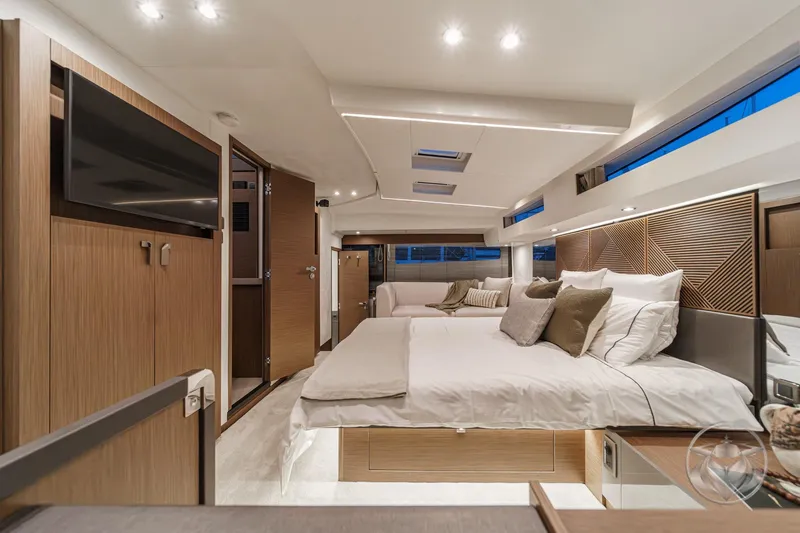 Slide: The Image of Luxurious interior of 2026 Prestige M48 yacht with modern design and comfortable bedding. - 57