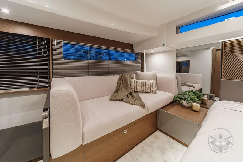 Slide: The Image of Luxurious interior of 2026 Prestige M48 yacht with elegant seating and decor. - 58
