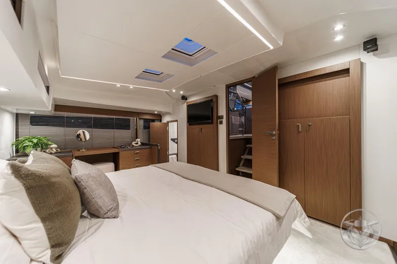 Slide: The Image of Luxurious interior of 2026 Prestige M48 yacht with modern bedroom design and elegant furnishings. - 59