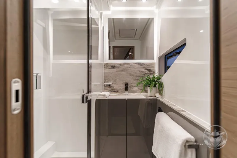Slide: The Image of Luxurious bathroom in 2026 Prestige M48 yacht, featuring modern fixtures and elegant design. - 60