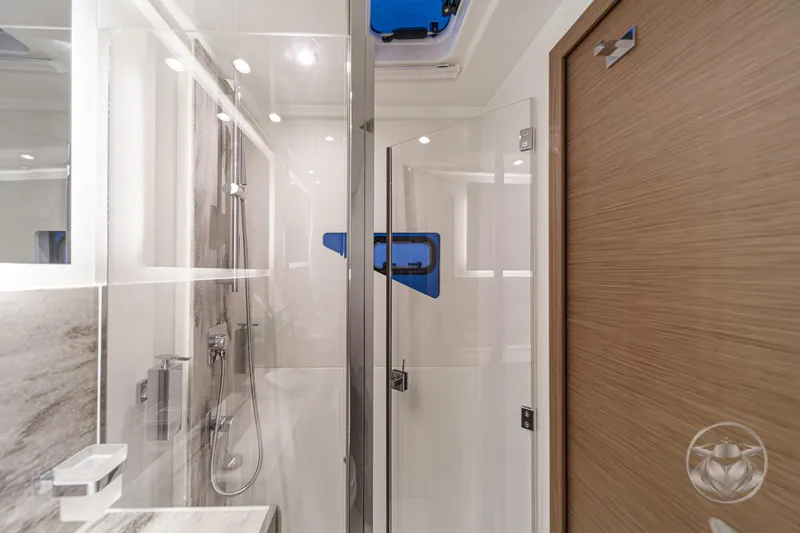 Slide: The Image of Modern bathroom interior in 2026 Prestige M48 yacht, featuring sleek design and glass shower. - 62
