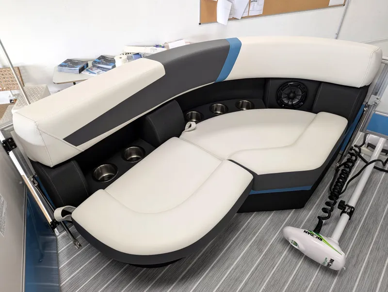 Slide: The Image of 2025 Trifecta CS 22RFC boat seating with cup holders and speaker. - 11