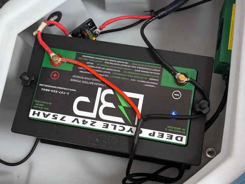 Slide: The Image of Deep cycle 24V 75Ah battery in Trifecta CS 22RFC 2025 model. - 14
