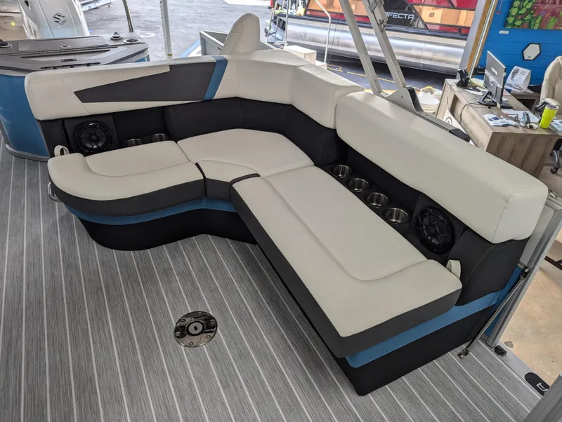 Slide: The Image of 2025 Trifecta CS 22RFC boat interior with modern seating and cup holders. - 17