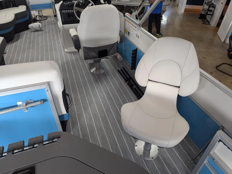 Slide: The Image of Interior of 2025 Trifecta CS 22RFC boat with modern seating and striped flooring. - 23